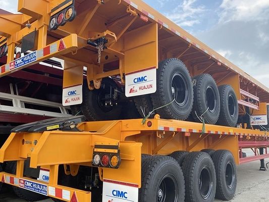 Κύρια δέσμη T700/Q345 Χάλυβα ημιπροκατασκευή CIMC HUAJUN 3 Άξονας Flatbed Trailer Train